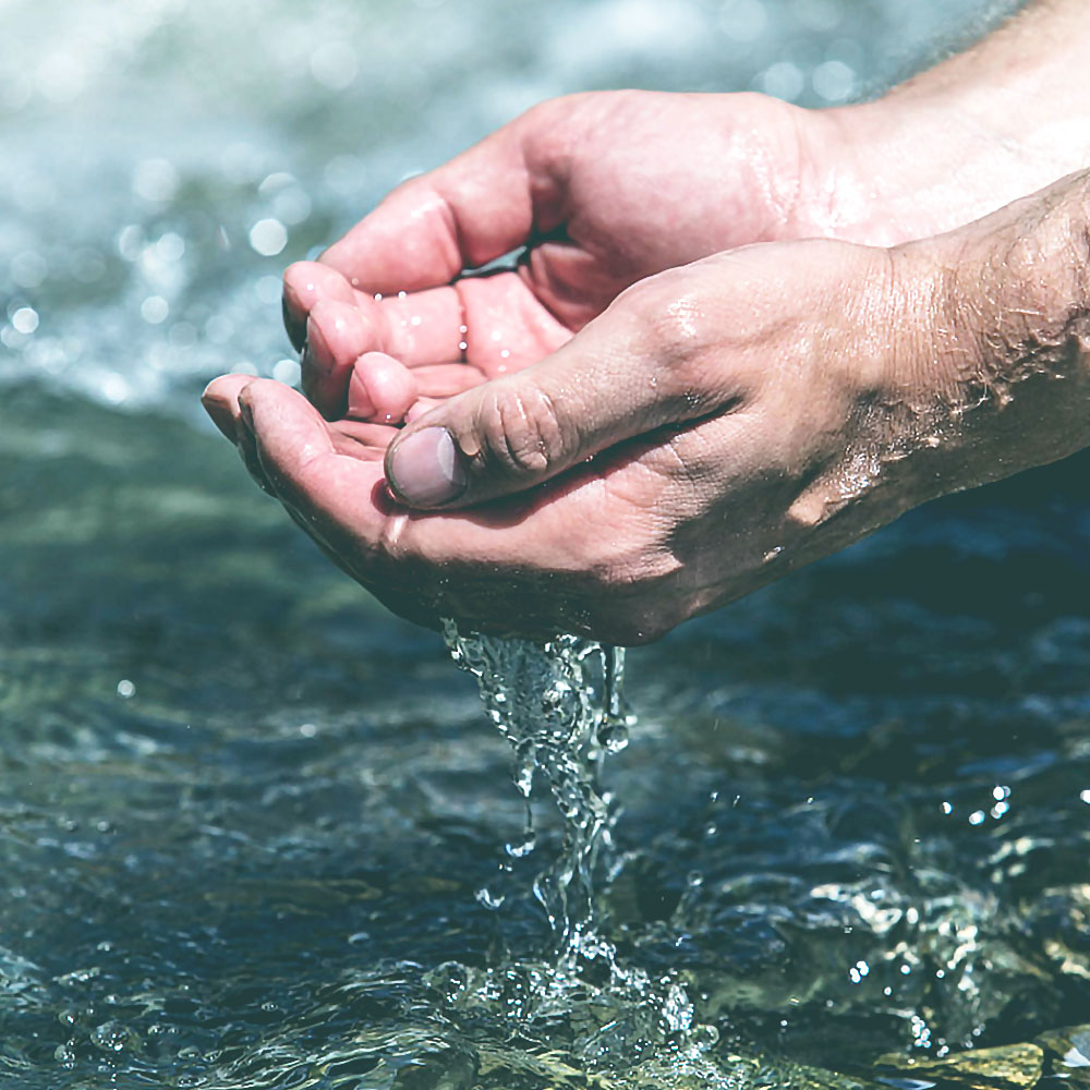 Washing hands in a stream | Save Tarrant Water